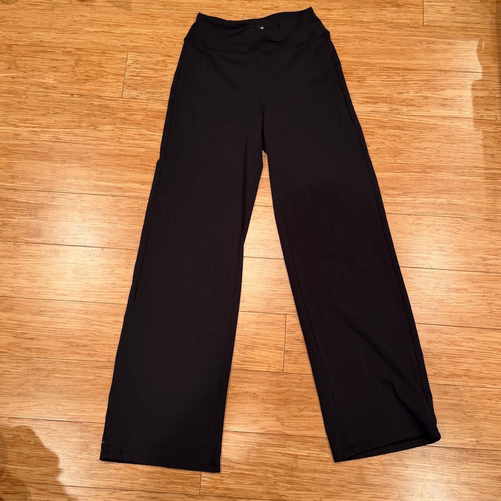 Wide leg yoga pants. Can get away with wearing to work. Barely worn